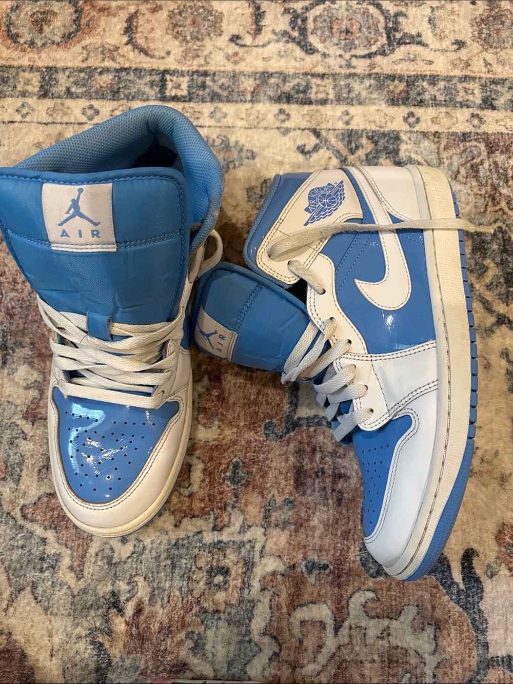 Jordan Air 1 High Top Sneakers in University Blue and White